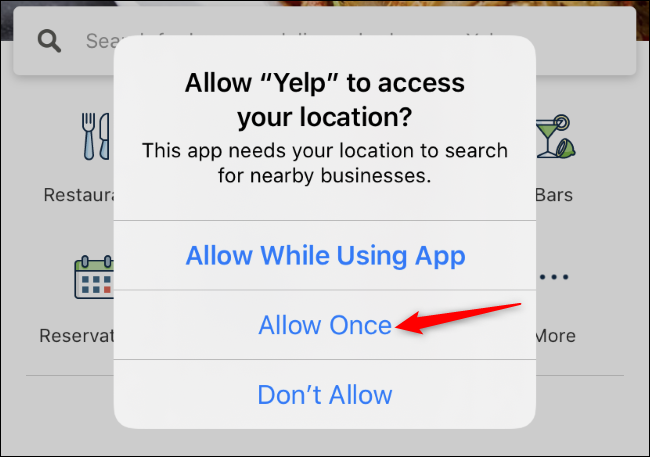 A permission request from the Yelp app to access the owner's location on an iPhone.