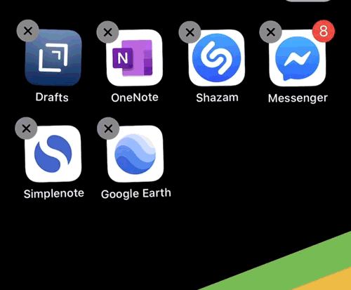 An animated GIF demonstrating how to select and move multiple app icons on the Home screen.