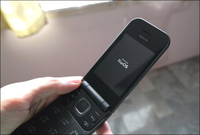 A Nokia 2720 flip phone running KaiOS.