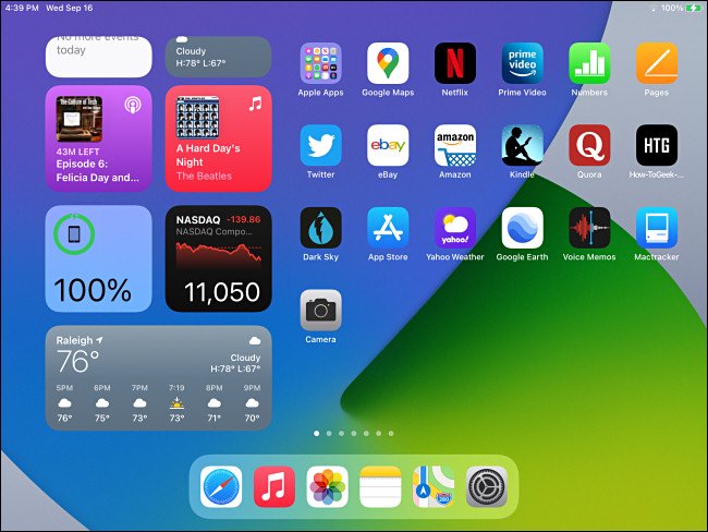 The iPadOS 14 home screen with Today View widgets visible.