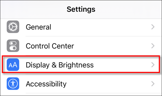 Tap "Display & Brightness" in iPhone Settings.